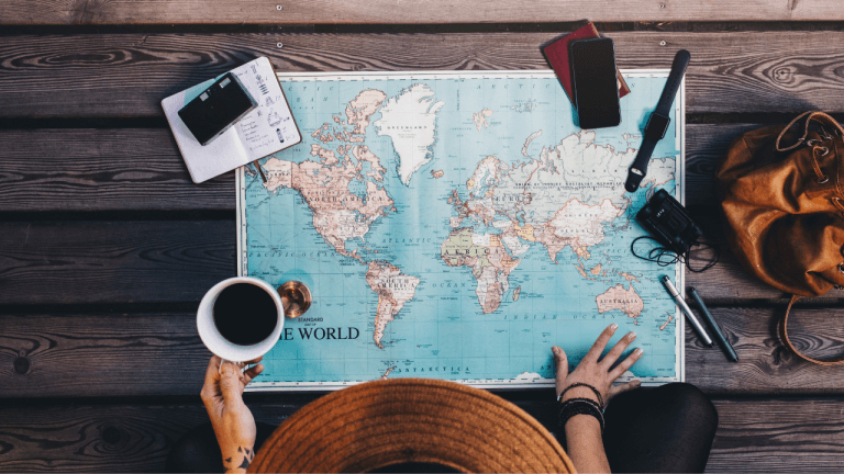 map on table to explore and immigrate to canada
